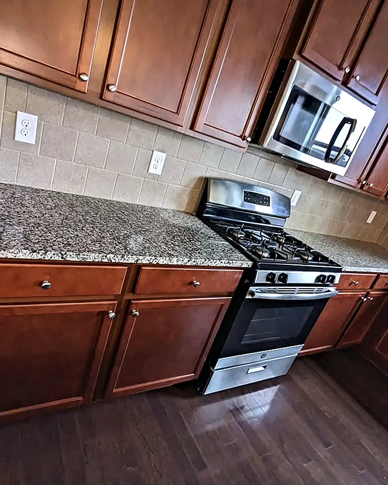 Kitchen with granite counters, cleaned