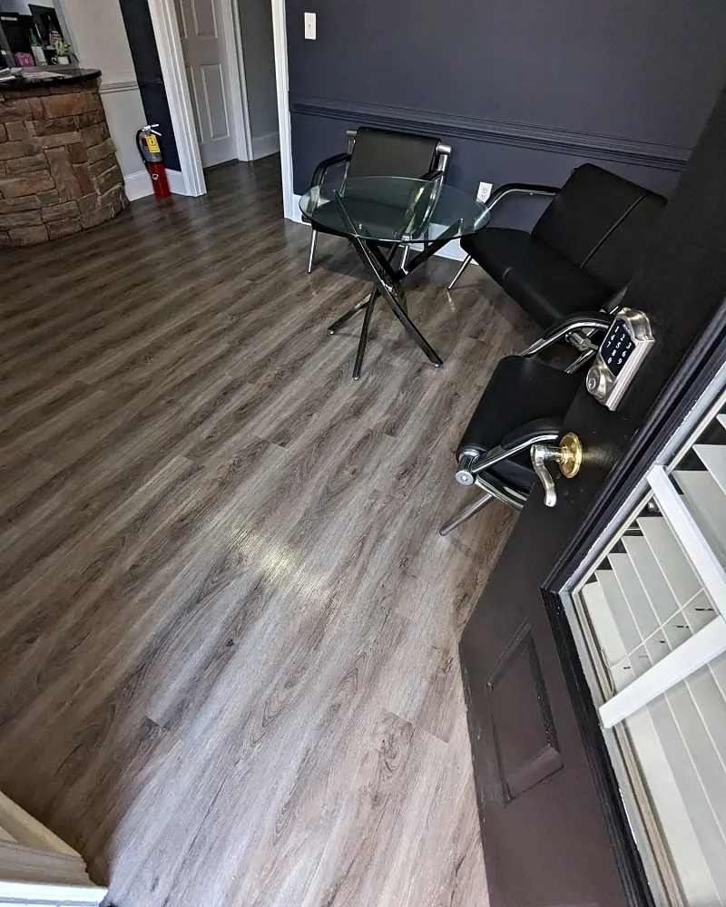 Office lobby with a glass table and clean floor