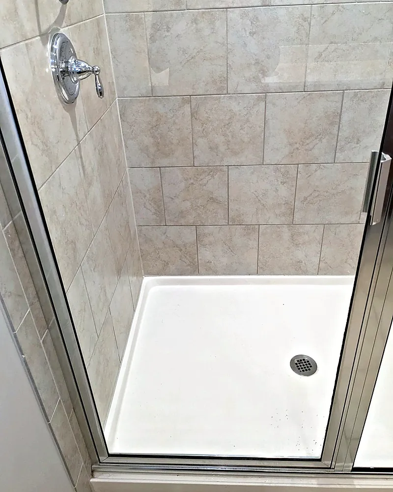 Tiled shower stall, spotless